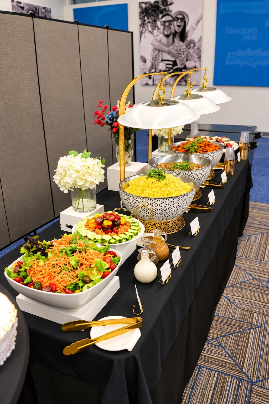 buffet presentation with salads and warm dishes in gold-accented serving bowls